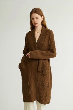 Elevate Your Look with the Ultimate in Wool Comfort and Style Revel in the timeless charm of our Casual Wool Belted Duster Cardigan. Crafted from 100% wool, this piece ensures a luxuriously soft, cashmere-like feel. Its high moisture-wicking and excellent elasticity keep you comfortable and dry, while its thick knit design offers superb warmth. Style-wise, it exudes a serene, age-reducing aura with its collarless design and stretchy fabric. The loose fit and medium length make it versatile for a Duster Cardigan, Wool Crafts, Wool Cardigan, Women's Casual, Knitting Designs, Stretchy Fabric, Chocolate Brown, Medium Length, Moisture Wicking