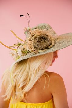 Feel fabulous in the sun with this sun hat featuring a blue and gold color scheme, white flowers with a green stem, and a unique bird nest design. Perfect for a day at the races or any outdoor event. This hat is ONE OF A KIND, created by our owner Stephanie. To receive item quicker, expedited shipping is available at checkout. Blue And Gold Color Scheme, Day At The Races, Gold Color Scheme, Nest Design, Outdoor Event, Bird Nest, Blue And Gold, Sun Hat, Sun Hats