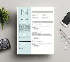 a clean and modern resume template is displayed on a desk next to a camera, cell phone