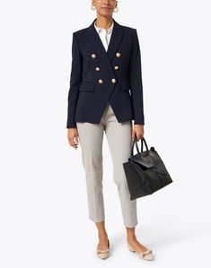 Veronica Beard's Miller Jacket is a best-seller season after season, and this version in transitional suiting with decorative gold crest buttons is sure to be a timeless classic. A slight stretch allows for a comfortable and flexible fit, while the slim tailoring delivers a polished look every time. Our stylist recommends pairing this navy jacket with a Veronica Beard dickey for a layered and comfortable look. Veronica Beard Dickey, Veronica Beard Blazer, Skirt And Top Dress, Work Accessories, Cashmere Poncho, Single Button Blazer, Navy Jacket, Work Jackets, Embroidered Jacket