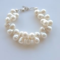 A large and special pearl bracelet for a woman. These pearls are drilled and strung in a special way to have a delicate vining pattern. (Pearls will have to be flipped over once the bracelet is put on so that every other one goes one way and every other goes the other. Some of them will lay down correctly, naturally. Size: 16.5 cm +3.5 Extra/ 6.49 Inches Features: ❤ Freshwater Pearl, and Silver 925 ❤ Handmade item ❤ All my jewelry is sent in a beautifully decorated box (perfect for a gift)We als Pearl Bead Bracelet, Bracelet Pearl, Big Pearl, Freshwater Pearl Bracelet, Bead Bracelet, Pearl Bracelet, Pearl Beads, Favorite Jewelry, My Jewellery