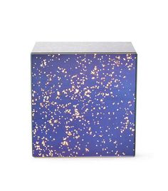 a blue box with gold speckles on it