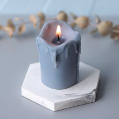 a candle that is sitting on top of a table