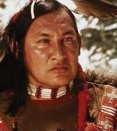 an native american man with feathers on his head