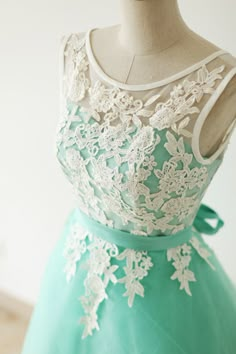 Lovely color combo of ivory and aqua blue. Modest front neckline with deep V back. Extra lace appliques on the skirt and then faded to plain. Mint Green Homecoming Dresses, Turquoise Lace, Lace Prom Dresses, Green Homecoming Dresses, Cute Homecoming Dresses, Lace Bridesmaids, Lace Prom Dress, Lace Homecoming Dresses