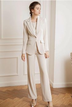 Experience luxury and sophistication in our Three Pcs Beige Pantsuit Set, featuring a beautiful silk blouse and pants made of the finest quality silk. Elevate your wardrobe with this exclusive set, perfect for any occasion. Three Pcs Beige Pantsuit Set Description: Peak lapels; front button blazer V-neck, Long sleeves; button cuffs. Structured shoulders. Chest welt pockets. Hip flap pockets Polyester 100% Silk blouse Wide leg loose fit pants Imported Brand - Aision Model Number - 22CPB82 Washing Beige Pant Suit Women, Beige Suit Outfit Women, Cream Suits Women, Blazer And Pants Set Women, Beige Suits Women, Beige Pantsuit, Online Shopping Clothes Women, Khaki Suit, Blouse And Pants