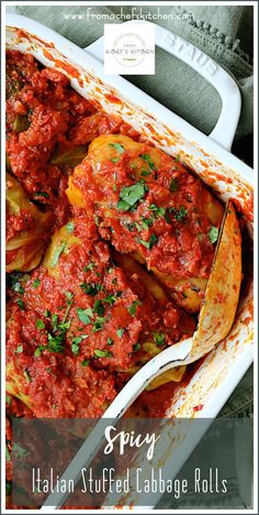 a casserole dish with meat and vegetables in red sauce, garnished with parsley