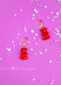 New Minimalist 14k Gold Plated Cute "Yummy Gummy" Bear Huggie Hoop Earrings in Red Handmade Jewellery Introducing the Yummy Gummy Bear Collection! These playful and vibrant earrings feature 14k gold-plated huggie hoops paired with adorable acrylic bear charms, perfectly mimicking the look of your favourite gummy bears. Handmade with care, each pair in this collection comes in a variety of fun and colourful options, making them the perfect accessory to add a touch of whimsy to any outfit. The sma Trendy Red Earrings For Birthday, Trendy Red Jewelry For Birthday, Red Novelty Jewelry For Birthday, Playful Small Hoop Jewelry For Gifts, Nickel-free Red Jewelry For Birthdays, Fun Small Hoop Earrings As Gift, Playful Small Hoop Jewelry Gift, Fun Small Hoop Jewelry For Gifts, Playful Hypoallergenic Hoop Earrings As Gift