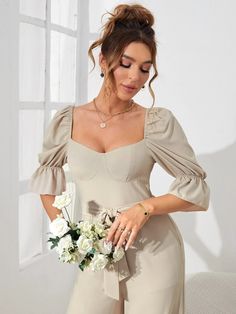 This fabulous Half-Sleeve Belted Wide Leg Jumpsuit is sure to add a touch of style and elegance to any wardrobe. The ruffle details, belted waistline, and zipper are sure to turn heads wherever you go. Its half-sleeve length and square neck provides flattering coverage while the high-waisted fit ensures a comfortable look that hugs your curves in all the right places. Specifications: Details: Ruffle, Belted, Zipper Sleeve Length: Half Sleeve Neckline: Square Neck Waist Line: High Waist Fabric: N Clean Body, Flounce Sleeve, Wide Leg Jumpsuit, Half Sleeve, Half Sleeves, Length Sleeve, Types Of Sleeves, High Waist, Wide Leg