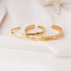 Surprise him or her with a matching set of personalized couple's bracelet. The couple's set comes with one black bangle for him and a choice of silver, gold, or rose gold for her. Both bracelets are adjustable to fit all wrist sizes, by stretching both ends outward. Bracelets can be personalized with loving words, nicknames, anniversary date, or Roman numeral dates. The bracelet's each surface can engrave to 25-30 characters with a choice of 7 fonts and a variety of icons. The personalized brace Personalized Adjustable Bracelet For Anniversary Gift, Gold Couples Bracelets As Gift, Gold Couples Bracelets For Gifts, Personalized Bangle Bracelet As A Gift, Personalized Bangle Bracelets As Gift, Couples' Stainless Steel Bracelets As Gifts, Couples Stainless Steel Bracelets As Gifts, Personalized Bangle Bracelet As Gift, Elegant Personalized Wristband For Gift