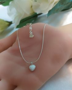 "Cute OPAL Heart Charm Necklace- Sterling Silver 925 , Dainty Heart pendant This cute sloth necklace is delicate but eye catching It would make a very special gift for somebody you love :) ♥ Shown at size 16\" ♥ Dimensions of the Heart charm - 11.8mm x 7.4mm /0.74\"x0.29\" ♥ The sloth pendant is available in full sterling silver 925 ♥ You can choose the size 13\"-20\" ♥ High Quality Designer Jewelry ♥ Comes in a cute little package ready for gifting. ♥ Comes with a card. As in photo or you can S White Heart Pendant Necklace For Birthday Gift, White Sterling Silver Necklace With Heart Charm, Tiny Sterling Silver Necklace For Anniversary, White Heart Pendant Jewelry For Birthday Gift, Stamped 925 Heart Pendant Jewelry As Gift, Silver Sterling Heart Necklace For Birthday, Silver Sterling Silver Heart Necklace For Birthday Gift, White Sterling Silver Necklace For Valentine's Day, White Gold Heart Pendant Necklace For Birthday