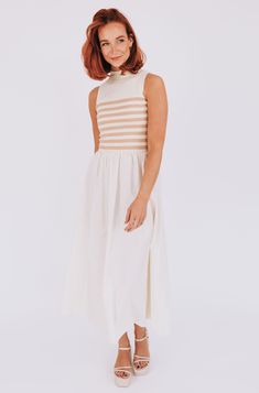 Get ready to set sail in style with our Sail Away With Me Dress! Featuring a ribbed knit bodice for comfort and a high neckline for a chic look. The contrasting fabrics add an extra touch of flair to this must-have dress. Perfect for any occasion, this dress will have you feeling confident and ready to conquer the day! Details Ribbed knit bodice High neckline Contrasting fabrics Sizing Approximate measurements: SIZE LENGTH BUST Small 53"﻿ 28"﻿ Medium 54"﻿ 30"﻿ Large 54"﻿ 32"﻿ Fabric has stretch Chic A-line Ribbed Midi Dress, Chic A-line Ribbed Dress, Chic High Neck Daywear Dresses, Chic High Neck Day Dresses, Chic Ribbed A-line Dress, Chic High Neck Dress For Daywear, Spring Ribbed Turtleneck Dress, Chic White Ribbed Midi Dress, Summer High Neck Beige Dress