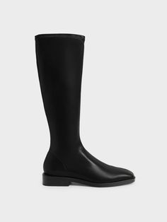 It is never too late to get yourself a pair of knee-high boots, and these could be the one for you. With their sleek black colour, you can trust them to quietly slot into any ensemble to boost your style without disrupting what you already have going on. Plus, the square toe design is easy on the eyes and the 2.5cm low heel is perfect for all-day walks. For an elegant ensemble, style them with a shirt dress and a saddle bag. Long Flat Boots, Boots Outfit Inspiration, Square Toe Knee High Boots, Knee High Flat Boots, High Flat Boots, Knee High Boots Outfit, Black Flat Boots, 2023 Wardrobe, High Boots Outfit