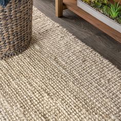 Natural jute fiber and a chunky texture make this handwoven rug a great addition to your home. The solid color works almost anywhere, in both modern or traditional rooms. This rug is reversible for longer wear. JONATHAN Y Natural Fiber Pata Hand 5 X 8 (ft) Woven Jute Light Ivory Indoor Solid Bohemian/Eclectic Area Rug in Yellow | NRF102B-5 Jute Lights, Rustic Area Rugs, Eclectic Area Rug, Bohemian Eclectic, Square Area Rugs, Target Rug, Jute Area Rugs, Light Ivory, Bohemian Area Rugs