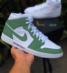 Introducing the Green Custom Air Jordan 1, perfect for style and comfort on and off the court. Carefully crafted with premium materials, this iconic sneaker offers a unique twist to a classic style. Enjoy this timeless silhouette with all-day comfort and style. Exactly as shown in the pictures. 📷 Brand New & Authentic. 💯 Hand Painted with attention to detail. 👨‍🎨 Waterproof and Flexible. ❤️ Unisex model. Please refer to the Size Chart. 👟👫 Free Worldwide Shipping. ✈️🌍 Classic Green Custom Sneakers For Streetwear, Classic Green Custom Sneakers With Gum Sole, Green High-top Modern Basketball Shoes, Modern Green High-top Basketball Shoes, Trendy Custom Sneakers With Gum Sole, Modern Green High-top Sneakers, Green High-top Basketball Shoes With Speckled Midsole, Modern Green Sneakers With Gum Sole, Casual High-top Tennis Sneakers With Round Toe