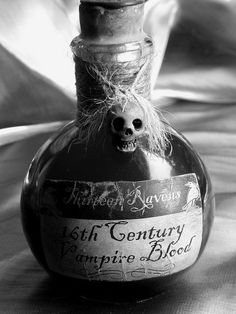 an old fashioned bottle with a skull on it