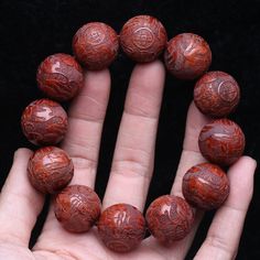 Choose from a variety of different woods for your Lucky Pixiu Good Karma Bracelet  These wooden beads are engraved with the mythical beast, the PIXIU, from natural, unstained wood. The Pixiu symbolizes good fortune, and protection.    These bracelets are made up in a variety of different woods including ebony, white wood, violet wood, golden wood,wenge wood, nanmu wood, Zambian rosewood and gold silk wood.     Or if you prefer, you can have a mixture of different wood beads in one bracelet.   Choose from either 15mm beads (total of 15 beads/bracelet) for women or 20 mm ( total of 12 beads/bracelet ), more suited for men.    Want to know more about the Feng Shui Pixiu?     The Pi Xiu is a legendary auspicious creature and is known for wealth attraction and is one of the five auspicious anim Wooden Bead Bracelet, Inner Energy, Karma Bracelet, Buddhist Bracelet, Wenge Wood, Wooden Bracelet, Mythical Beast, Gold Silk, Wedding Ties