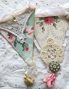 three pieces of fabric with lace and flowers on them