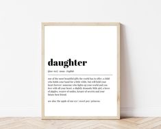 a framed poster with the words daughter in black and white