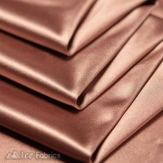 Casino Shiny Rose Gold Spandex 4 Way Stretch Satin Fabric ICE FABRICS Loz Cosplay, David Zyla, Rose Gold Fabric, Rose Gold Satin, Stretch Satin Fabric, Wholesale Roses, Classy Dresses, Satin Pillowcase, Gold Satin