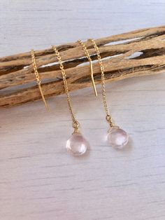 Rose Quartz Threader Earrings, Rose Quartz Modern Earrings, Pink Minimalist Chain Earrings, Dainty Pull Through Earrings, Boho, gift for her Rose Quartz teardrops suspended from 14k gold filled or sterling silver ear threaders. Ideal for a modern look, super clean and minimalistic earrings. Great choice of bridesmaids earrings they can continue to use on a daily basis. Stone Size: 8 mm Stone Shape: Teardrop Earring Length: 35 mm Material: Choice of 14k Gold Filled or Sterling Silver Gift Wrappin Rose Gold Crystal Earrings For Pierced Ears As Gift, Rose Gold Crystal Earrings As A Gift, Hypoallergenic Rose Gold Crystal Earrings As A Gift, Rose Gold Hypoallergenic Crystal Earrings For Gift, Hypoallergenic Rose Gold Crystal Earrings For Gift, Gift Hypoallergenic Rose Gold Crystal Earrings, Rose Gold Briolette Earrings, Rose Gold Dainty Crystal Earrings For Pierced Ears, Rose Gold Dainty Crystal Earrings