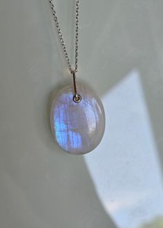 💥 💥 💥 Rainbow Moonstone pendant with sterling silver details. 🌸 Pendant, including bail: 33 mm x 22 mm/ 1.3" x 0.86" 🌸 All photos are  enlarged to better view the detailing of every item, please always check the measurements. ✓Because of the natural crystal structure, natural  gemstones could have some small visible scars and crackles. ✓ Solid 925 Sterling Silver (925 parts per 1000) ✓ 925 Silver Hallmarked ✓ Every natural stone is different and exclusive in pattern and shape, and with its Handmade Oval White Gold Necklace, Sterling Silver Moon Charm Necklace With Oval Pendant, Sterling Silver Oval Pendant With Moon Charm, Oval Moonstone Necklaces With Moon Charm, Spiritual Oval Jewelry With Moon Charm, Oval White Gold Jewelry With Large Stone, Sterling Silver Oval Necklace With Moon Charm, Oval Moon Charm Jewelry Gift, White Oval Jewelry With Moon Charm