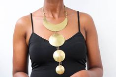 MARA African brass necklace has a hammered texture hence making it appealing.

Material: Upcycled brass

Processing Time: Ready to ship within 1-3 days

Shipping fee is calculated during checkout

Shipping: DHL Express shipping with 3-5 days delivery

Care instructions:

Brass tarnishes with exposure to moisture and oxidation.

To clean it, kindly use a lemon wedge. Squeeze the juice and polish along the surface with a clean cloth. Deer Necklace, Lemon Wedge, Gold Long Necklace, Beaded Collar, Brass Necklace, Jasper Pendant, African Jewelry, Christmas Gift For Her, Yellow Gold Pendants