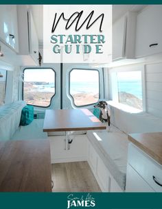 the interior of a camper with windows and wood flooring