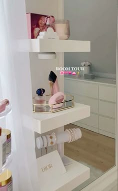 a white shelf filled with cosmetics and personal care items