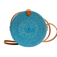 The Ata Bali is the must-have crossbody bag for all of your warm-weather events - from vacations to beach days. Keep your belongings secure with the Snap closure and the beautiful fabric-lined interior. Wipe Clean / Rattan Trendy Light Blue Shoulder Bag For Summer, Casual Light Blue Summer Bags, Summer Straw Crossbody Bag For Daily Use, Summer Woven Crossbody Shoulder Bag, Summer Vacation Shoulder Bag With Single Strap, Light Blue Summer Tote Shoulder Bag, Trendy Beach Straw Bag With Detachable Strap, Summer Shoulder Bag For Beach Season, Summer Shoulder Bag For Beach Outings