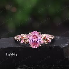 Oval cut Pink Sapphire Engagement ring Rose Gold Promise Ring Leaf Nature Inspired Bridal Ring Sept Gemstone Ring anniversary gifts Jewelry Ring Details: - Theme:Romantic Wedding & Engagement - comfortable band - Stone:6*8mm lab created pink sapphire Side stones: lab created pink sapphire - Total weight: 0.09 ctw (High Quality) - ring band width :1.5mm - ring thicknesses:1.2mm Wedding Band:0.065ctw Stones: 0.065ctw lab created pink sapphire +moissanite - ring band width :1.5mm - ring thicknesses:1.2mm - Metal choose:10k or 14k or 18k rose gold / white gold/yellow gold Service: -Completely Handmade -The highest quality in the industry -Money back guarantee -Materials from ethical sources -10 years of business experience -100% genuine -2-3 Week to finish jewelry -Accept customization We beli Oval Diamond Ring For Valentine's Day Gift, Rose Gold Proposal Rings For Mother's Day, Valentine's Day Rose Gold Crystal Ring, Pink Topaz Promise Ring In Round Shape, Pink Topaz Promise Ring With Round Shape, Pink Round Topaz Promise Ring, Pink Gold Solitaire Wedding Jewelry, Pink Gold Solitaire Jewelry For Wedding, Pink Gold Open Ring Jewelry For Wedding