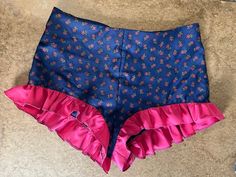 "Sizes S,M,L ruffle hot pants with center back zipper. These are short shorts.   medium measurements: 32\" waist 36\" high hip 40\" low hip   navy/fuchsia: recycled synthetic fiber, Nylon or polyester  light blue with white stripes: recycled natural fibers, cotton or linen  These are made to order too so you can choose what fabric based on color but these or mostly floral. Some have contrasting ruffles. Open to working on the design together!" Fitted Short Bloomers For Spring, Stretch Ruffled Short Bottoms, Short Stretch Ruffle Bottoms, Summer Fitted Ruffled Bloomers, Fitted Ruffled Bloomers For Summer, Summer Ruffled Fitted Bloomers, Summer Ruffled Bloomers, Fitted Short Bottoms With Ruffles, Fitted Ruffled Short Bottoms