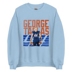 George Tarlas "Gameday" Sweatshirt - Fan Arch Blue Fleece Fan Merchandise Sweatshirt, Blue Fan Apparel Sweatshirt For Fall, Blue Fleece Sweatshirt With Graphic Print, Blue Fleece Crew Neck Sweatshirt, Relaxed Fit Blue Pre-shrunk Sweatshirt, Blue Relaxed Fit Pre-shrunk Sweatshirt, Fleece Crew Sweatshirt Fan Apparel, Relaxed Fit Fan Apparel Sweatshirt For Winter, Blue Crew Sweatshirt For Sports Events