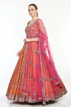 Orange anarkali with floral motif embroidery highlighted with mirror work. Comes with mirror work dupatta.
Components:2
Pattern:Embroidered
Type of Work:Mirror Work
Neckline:V-Neck
Sleeve Length:Sleeveless
Fabric:Crepe, Modal Satin, Butterfly Net
Color:Orange
Other Details:
Beaded neckline
Floral motifs
Occasion:Bride,Wedding - Aza Fashions Navratri Kundan Gown With Resham Embroidery, Semi-stitched Dola Silk Anarkali Set With Dori Work, Semi-stitched Anarkali Set With Dupatta For Reception, Unstitched Floor-length Anarkali Set With Dori Work, Designer Orange Lehenga With Mirror Work, Floor-length Dori Work Salwar Kameez For Navratri, Navratri Gown In Chinon With Dori Work, Chinon Gown With Dori Work For Navratri, Navratri Chinon Gown With Dori Work