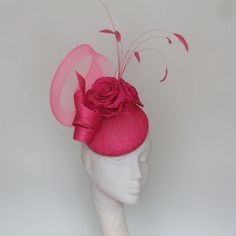 A very stylish pink sinamay button fascinator with a large hand crafted  silk rose, feathers and crinoline. Perfect when you don't feel like wearing a large hat. Gorgeous statement fascinator for weddings and race days This fascinator can  be made in lots of other colours Pink Pillbox Hat, Fascinator Hats Outfit, Fascinator Hats Diy, Mother Of The Bride Hats, Fascinator Hats Wedding, Red Fascinator, Kentucky Derby Fascinator, Large Hat, Royal Ascot Hats