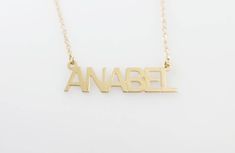 "Capital name necklace. Name necklace.Personalized gold necklace. Gold name necklace. Gold personalized necklace. Name jewelry. gift for her 🌟 Name necklace info: Capital letters name necklace. Gold plated 18k brass.or plan sterling silver 925. The measurements of the name plate changes according to the name you order. The name plate is 0.8 thick. Letters are 10 mm high. Lengths available - 16\", 18\", 20\", 22\". 🌟 Shipping Info: All necklaces are packaged and shipped in a beautiful gift box. Everyday Nameplate Necklace With Names, Everyday Nameplate Necklace, Everyday Nameplate Name Necklace, Gold Minimalist Personalized Name Necklace, Gold Nameplate Necklace For Everyday, Custom Name 14k Gold Necklace For Mom, Dainty Customizable Gold Name Necklace, 14k Gold Custom Name Necklace For Mom, Personalized Gold Name Necklace For Birthday