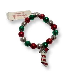 Really Cute Stretch Christmas Bracelet By Periwinkle By Barlow. It’s Made From Metallic Green, Metallic Red, And Silver Beads. There’s A Christmas Stocking Charm On It. Bundle For Discounts. Gold Stretch Bracelet, Seashell Bracelet, Holiday Bracelets, Moms Bracelet, Red And Silver, Faux Pearl Earrings, Pretty Beads, Christmas Bracelet, Summer Bracelets