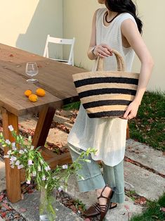 IN STOCK NOW SHIPPING FROM LOS ANGELES Add some summer vibes to your wardrobe with Elena Handbags' Raffia Basket Bag. Perfect for a day at the beach or a summer picnic, this bag features a stylish striped design and is made from durable and lightweight raffia material. Stay on trend and stand out with this must-have summer fashion accessory! Natural Soft Raffia Straw Handmade Size: 9"H x 14"W x 7"D Designer Style ID: 8652 Raffia Basket, Summer Fashion Accessories, A Day At The Beach, Straw Bags, Raffia Bag, Basket Bag, Day At The Beach, Denim Bag, Crochet Bags