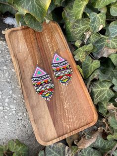 Abstract colorful beaded earrings, Fringe earrings, seed bead earrings, Native earrings, Boho chic style earrings, Dangle beaded earrings ♥𝑇ℎ𝑒 𝑝𝑎𝑡𝑡𝑒𝑟𝑛 𝑜𝑓 𝑡ℎ𝑖𝑠 𝑒𝑎𝑟𝑟𝑖𝑛𝑔 𝑖𝑠 𝑐𝑟𝑒𝑎𝑡𝑒𝑑 𝑏𝑦 𝐾𝑎𝑍𝑒𝐵𝑒𝑎𝑑𝐽𝑒𝑤𝑒𝑙𝑟𝑦 ♥𝑀𝑎𝑑𝑒 𝑢𝑠𝑖𝑛𝑔 𝑓𝑟𝑒𝑒ℎ𝑎𝑛𝑑 𝑏𝑒𝑎𝑑𝑖𝑛𝑔 𝑤𝑜𝑣𝑒𝑛 𝑡𝑒𝑐ℎ𝑛𝑖𝑞𝑢𝑒𝑠 𝑤𝑖𝑡ℎ 𝑠𝑡𝑟𝑜𝑛𝑔 𝑠𝑦𝑛𝑡ℎ𝑒𝑡𝑖𝑐 𝑡ℎ𝑟𝑒𝑎𝑑. ♥𝑇ℎ𝑒 𝑠𝑖𝑧𝑒 𝑜𝑓 𝑡ℎ𝑒 𝑠𝑒𝑒𝑑 𝑏𝑒𝑎𝑑𝑠 𝑢𝑠𝑒𝑑 𝑖𝑠 2 𝑚𝑖𝑙𝑙𝑖𝑚𝑒𝑡𝑒𝑟𝑠 𝑎𝑛𝑑 𝑏𝑒𝑎𝑑𝑠 𝑎𝑟𝑒 ℎ𝑖𝑔ℎ 𝑞? Summer Beaded Chain Dangle Earrings, Summer Beaded Chain Drop Earrings, Traditional Multicolor Beaded Earrings With Beaded Chain, Traditional Multicolor Beaded Chain Earrings, Multicolor Beaded Chain Earrings For Festival, Bohemian Multicolor Beaded Chain Earrings, Colorful Beaded Earrings With Dangling Round Beads, Multicolor Beaded Drop Earrings With Beaded Chain, Trendy White Beaded Earrings With Colorful Beads