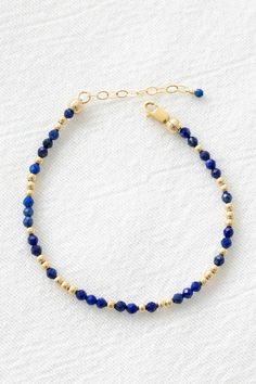 14k gold filled bracelet with 3mm lapis lazuli gemstones and 2.5mm gold filled beads Comes with an attached 1" extender chain! If you would like a different length that is not listed, please contact us for a custom order! Lapis Lazuli Bracelet, Bar Jewelry, Lapis Lazuli Beads, Jewelry Workshop, Crystal Beads Bracelet, Anklet Bracelet, Stamped Jewelry, Bracelet Ideas, Beads Bracelet