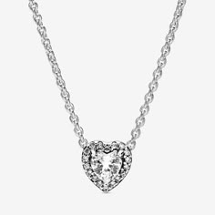 Let love guide your look with this sterling silver heart necklace, which can be worn in two different lengths thanks to its adjustable clasp. The sparkling healing heart cut of the cubic zirconia marks the first time this stone shape is being used in the Timeless Elegance collection and is a modern take on a love token, which is ideal as a gift for someone special. The contemporary design and elevated stone setting make it an easy to wear piece they’ll love for years to come. - Pandora Elevated Elevated Heart Necklace, Pandora Winter, Charms Disney, Pandora Necklace, Charms Pandora, Sterling Silver Heart Necklace, Heart Shaped Rings, Pandora Charm, Silver Heart Necklace