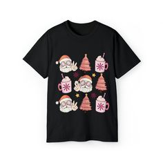 This t-shirt is perfect for celebrating the festive season with a touch of cuteness. The t-shirt is made of soft and comfortable cotton fabric that will keep you warm and cozy. The t-shirt comes in various sizes and colors to suit your preference. Whether you wear it to a party, a family gathering, or just for fun, this t-shirt will make you look adorable and festive. Order yours today and spread some holiday cheer! Cute Black T-shirt For Winter, Funny Print T-shirt For Christmas Gift, Cute Winter T-shirt With Graphic Print, Casual T-shirt As Holiday Gift, Cute Winter T-shirt For Gift, New Year Gift Crew Neck T-shirt, Cute Short Sleeve T-shirt For Winter, New Year Holiday Crew Neck T-shirt, Crew Neck T-shirt For New Year's Holiday