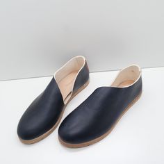 The Keiko is a translation of our most popular Sandy style to this much more casual roundtoe. A stitched back and roomy front, along with a rubberized sole make it a go to style for many occasions. This style features a removeable insert. The foam layer can be removed/replaced for a wider fitting shoe (we suggest to glue down the leather layer). Our new method of shoemaking has a double layer stitched back seam to provide heel structure without gripping the ankle. Made with our own olive leaf ta Modern Slip-ons With Rubber Sole And Round Toe, Everyday Slip-ons With Stitched Sole And Round Toe, Everyday Slip-ons With Rubber Sole And Flat Heel, Flat Leather Shoes With Rubber Sole For Everyday, Flat Heel Leather Shoes With Textured Sole For Everyday, Everyday Flats With Rubber Sole And Round Toe, Everyday Leather Shoes With Textured Sole And Flat Heel, Everyday Round Toe Flats With Rubber Sole, Everyday Slip-ons With Stitched Sole And Plain Toe