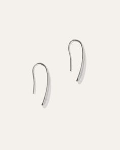 The Silver Threader Drop Earrings are stylishly unique with a modern design sure to make a statement. The high-quality sterling silver ensures durability and longevity, while the lightweight design ensures comfort for all-day wear. These earrings are a versatile and timeless accessory that will elevate any outfit.  | Quince | Women's Silver Threader Drop Earrings in Sterling Silver Modern Metal Teardrop Earrings, Classic Silver Wrap Earrings For Everyday, Classic Sterling Silver Wrap Earrings, Trendy Silver Wrap Earrings, Trendy Silver Wrap Earrings For Everyday, Adjustable Modern Single Wrap Earring, Modern Adjustable Single Wrap Earring, Trendy Everyday Silver Wrap Earrings, Modern Sterling Silver Teardrop Earrings