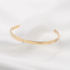 "14K gold cuff bracelet. 14K Gold Minimalist Cuff Bracelet * 14K solid gold. It is about 3mm x 1mm Please select the size of your wrist. If your wrist is 6\", please purchase 6\" bracelet. (If you order a 6\" bracelet, actual cuff length will be 5\" plus 1 inch opening.) Please read our policies before you place your order. https://www.etsy.com/shop/SashJewelry/policy?ref=shopinfo_policies_leftnav To see other Mother daughter necklace set click here: https://www.etsy.com/shop/SashJewelry?section Everyday Polished Yellow Gold Cuff Bracelet, Gold Open Cuff Bracelet With Polished Finish, Minimalist Rose Gold Bracelet With Polished Finish, Minimalist Polished Rose Gold Bracelet, Adjustable Minimalist Gold Bracelet With Polished Finish, Minimalist Open Cuff Bracelet, Classic Gold Open Cuff Bracelet, Minimalist Open Cuff Bangle For Everyday, Minimalist Gold Bangle Bracelet For Formal Occasions