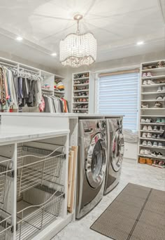 a washer and dryer in a room with lots of closet space