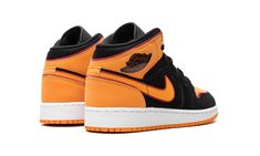 The Air Jordan 1 Mid GS "Vivid Orange" is the youth sizing of the colorway of the mid-top sneaker with orange and red accents.  The “Vivid Orange” Jordan 1 Mid is complete with a black synthetic nubuck base with tonal overlays on the toe, forefoot, and eyelets.  Vivid Orange accenting is seen on the perforated leather toe, collar, heel, and Swoosh.  The orange panels are outlined with red.  The blazing shade of orange can also be found on the Jumpman logo on the tongue.  A white rubber midsole a Orange Jordan, Air Jordan 1 Mid Gs, Jumpman Logo, Mid Top Sneakers, Orange Shoes, August 31, Mid Top, Kids Jordans, Air Jordan 1 Mid