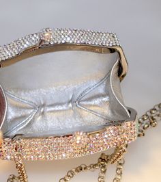 "Heart- stoppingly beautiful! These Formal Evening Purses in ALL SIAM RED, ALL SILVER GRAY, ALL LT. TOPAZ GOLD. All JET BLACK and ALL CLEAR AURORA BOREALIS Crystals in a hexagon shape will be the talk of town!! Each took a month to make, crystal by crystal! This is an evening bag that is fully covered in genuine, very fine, small sized Swarovski Crystals from Austria! Each minaudiere bag is fully crystallized in all sides with meticulous precision and spectacular detail. It is also lined in genu Elegant Crystal Evening Bag With Bling, Elegant Evening Bag With Crystal Bling, Embellished Crystal Evening Bag For Formal Occasions, Elegant Crystal Bags With Rhinestones, Glamorous Sparkling Evening Bag For Formal Events, Formal Embellished Crystal Evening Bag, Crystal Evening Bag With Rhinestones, Formal Crystal Evening Bag With Rhinestones, Sparkling Crystal Evening Bag For Events