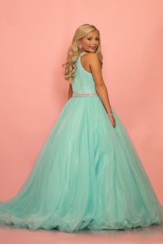 The Johnathan Kayne C114 dress is perfect for making a statement at your next formal event. The organza outer layer and satin lining are both beautiful and luxurious, while the fitted silhouette will flatter your figure. Whether you're attending a wedding or gala, this dress is sure to turn heads. Organza Outer, Dr Glass, Pastel Gown, Satin Ballgown, Floral Print Prom Dress, Prom Dress Ball Gown, Organza Styles, Johnathan Kayne, San Patrick