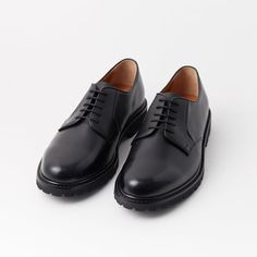 Black Leather Round Toe Derby Shoes | COSIMO | JOSEPHT.CA Black Leather Sole Lace-up Shoes For Business Casual, Black Loafers With Vibram Sole For Office, Black Office Loafers With Vibram Sole, Black Loafers With Vibram Sole For Work, Modern Black Loafers With Vibram Sole, Black Modern Leather Shoes With Rubber Sole, Modern Black Leather Shoes With Rubber Sole, Black Oxfords With Vibram Sole For Business, Black Plain Toe Loafers With Vibram Sole